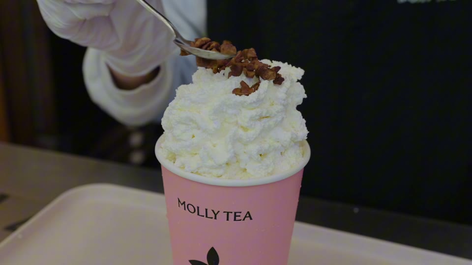 Molly Tea drink close-up from the team’s campaign footage
